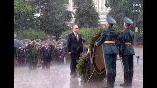 Putin braves rain to honor WWII victims [upl. by Ynnob]